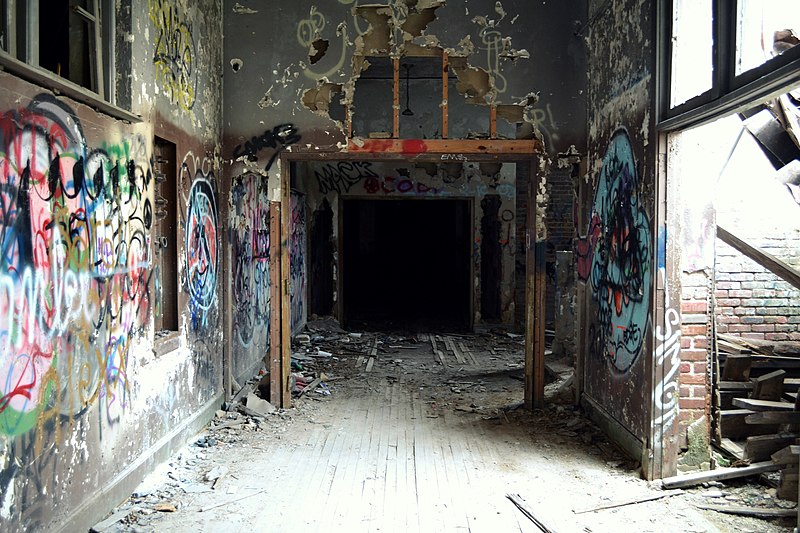 Graffiti covered hallway in the interior of the Devil's School 
